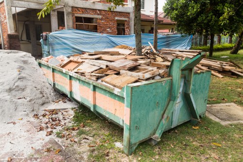Professional skip hire service delivering a skip in Dalston