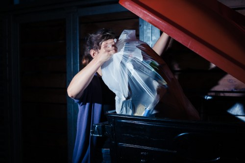 Customer service representative assisting with skip hire booking