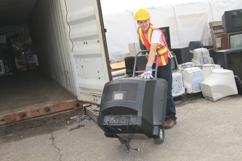 Workers segregating construction waste on-site